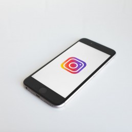 instagram logo on phone white background